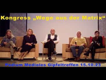 Bild: SS Video: ""Ihr werdet Ende 2024 Eure Welt nicht wiedererkennen" - Podium "Wege aus der Matrix" Oktober 2023" (https://youtu.be/n7Utdcrv9i4) / Eigenes Werk